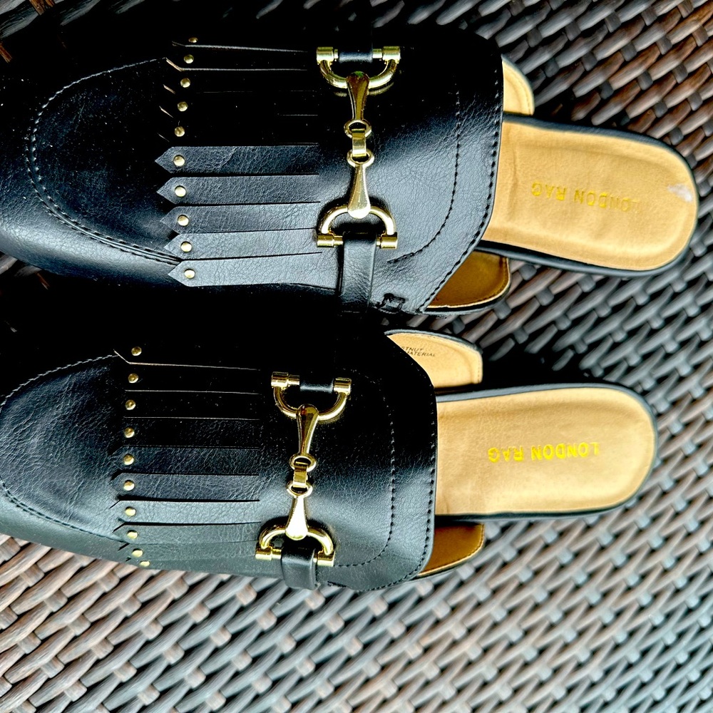Black leather mule with fringe with gold studs by London Rag.
